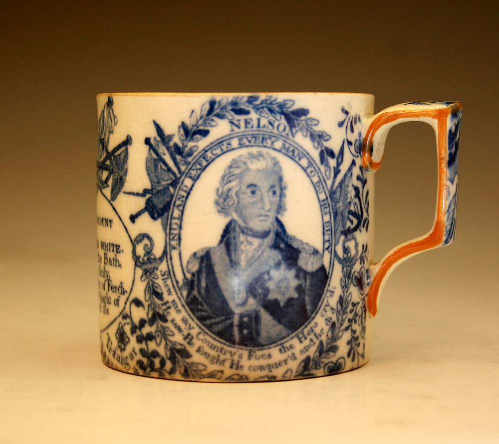 Nelson Commemorative pottery tankard in underglaze blue and white.