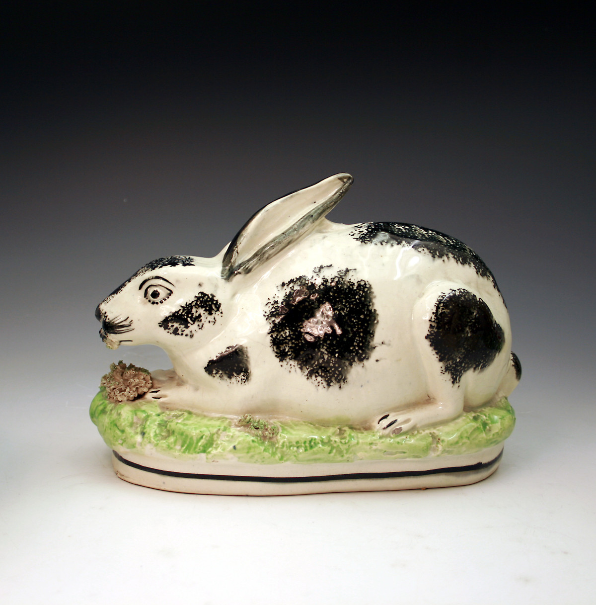 STAFFORDSHIRE POTTERY VICTORIAN FIGURE OF A CROUCHING RABBIT EATING MOSS