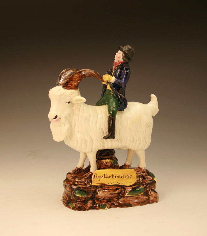 SCOTTISH POTTERY PRATTWARE FIGURE OF PAUL PRY ON A GOAT