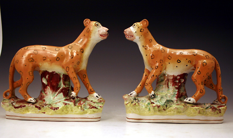Pair Staffordshire pottery figures of leopards Victorian period