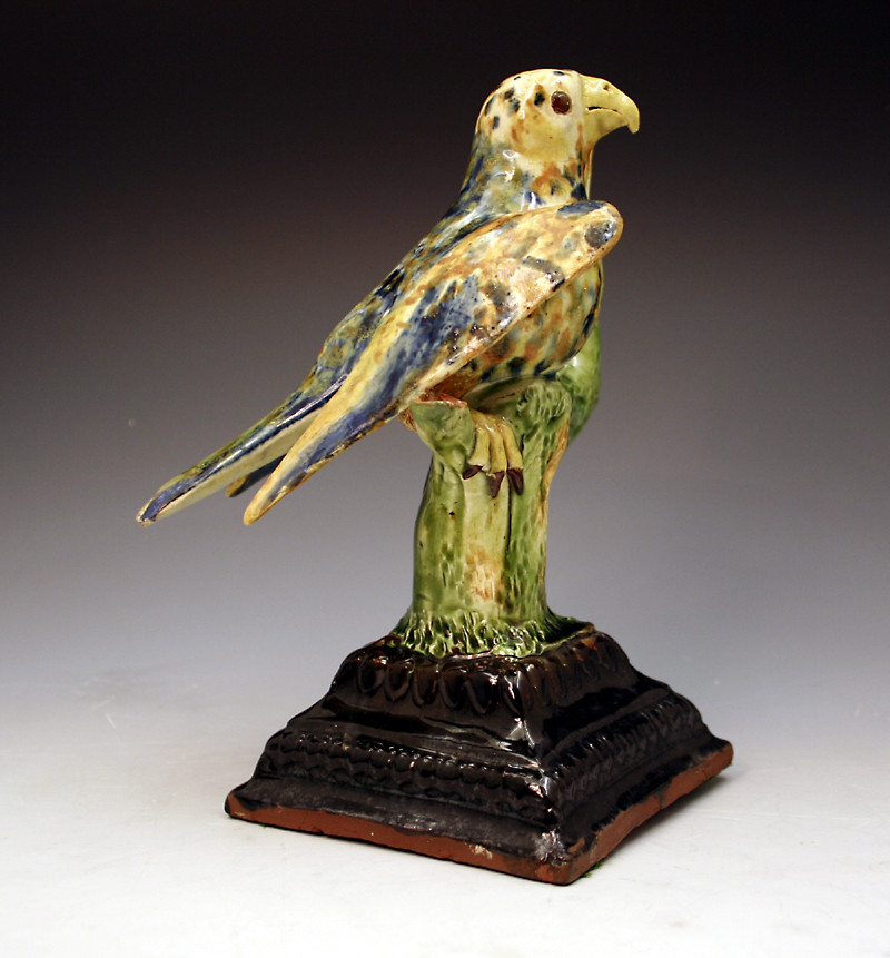 FOLK ART NAIVE MODEL OF A BIRD PERCHED IN TREE