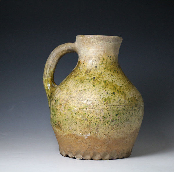 English earthenware medieval pitcher with thumbnail decoration 14th century