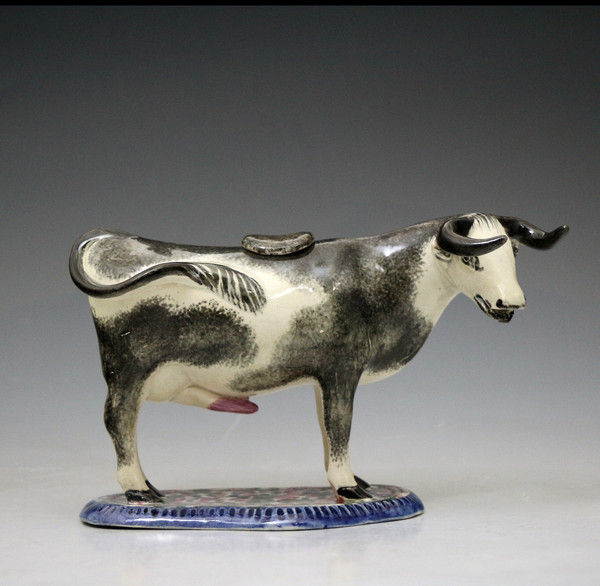 Antique pottery figure of a bull in the form of a creamer,Scottish or North East England  19th century