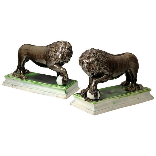 Pair of Staffordshire pottery figures of Lions by Ralph Wood, late 18th century England.