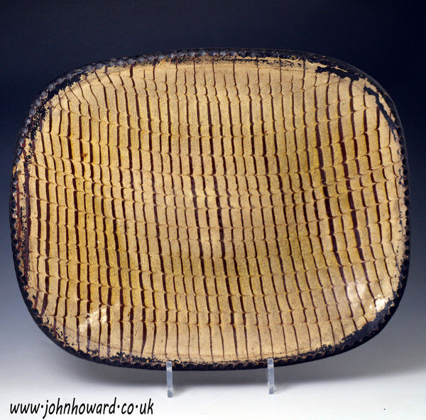Antique English slipware baking or loaf dish earthenware with comb decoration  c1810 period