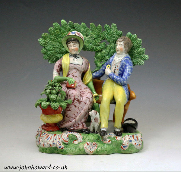 Staffordshire pottery figure Persuasion with pine cone bocage early 19th century English