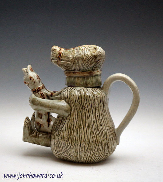Antique English pottery figure jug of a bear baiting . 18th century.