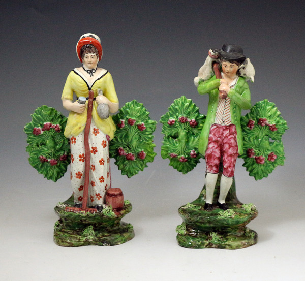 Antique Staffordshire pottery pair boage rural figures circa 1820 English