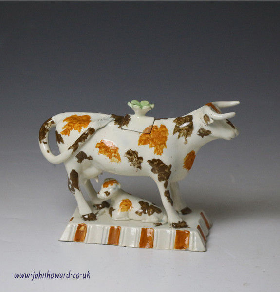 Antique English pottery cow creamer, Pratt colours late 18th century