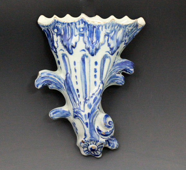 English delftware pottery wall pocket in blue and white mid 18th century