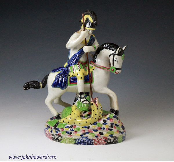English pottery figure group Saint George slaying the dragon made in 1815 period.