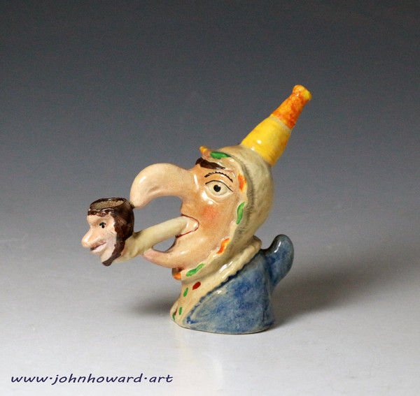 Antique Staffordshire pottery Punch and Judy  pipe in the form of Judy's head circa 1840