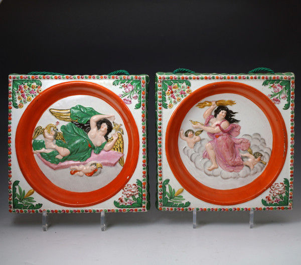 Pair of pottery pearlware plaques relief moulded with figures symbolic of night and day. Staffordshire early 19th century English
