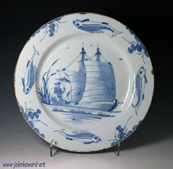 Antique English delftware dish with image of sailing ship decorated in blue and white mid 18thc.