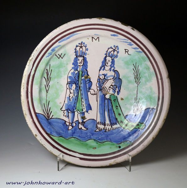 English delftware charger commemorative of William and Mary, London late 17th century period.