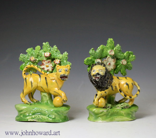 Antique Staffordshire pottery pearlware bocage figures of a Lion and Lioness circa 1820 period