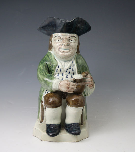 Staffordshire pottery Toby Jug in under colour glazes antique period England late 18th century
