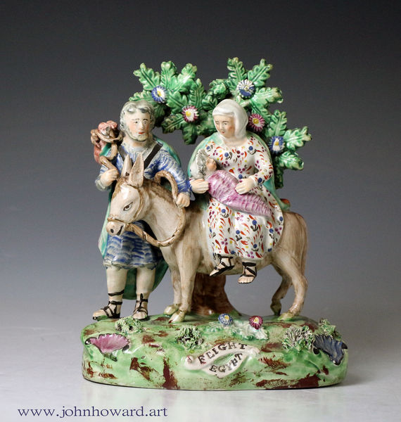 Staffordshire pottery bocage figure group Flight to Egypt, marked Walton.