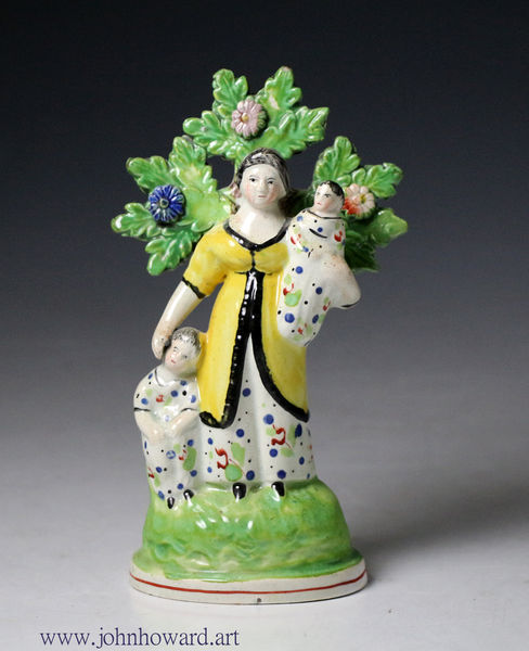 Antique Staffordshire bocage figure of Charity made in early part on 19th century England