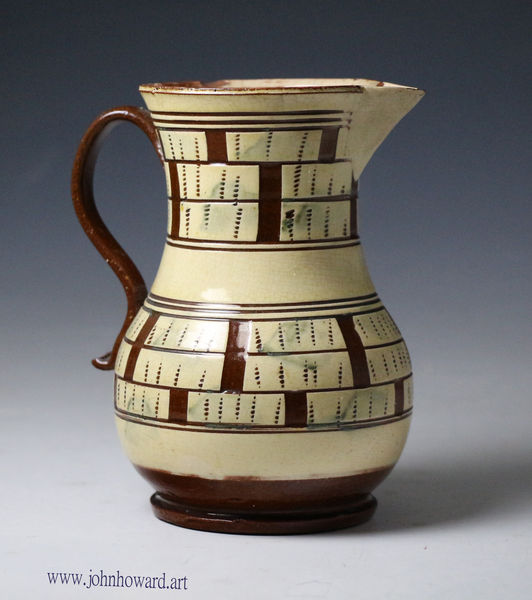 English slipware pitcher with scraffito checker board design mid 18th century antique period.