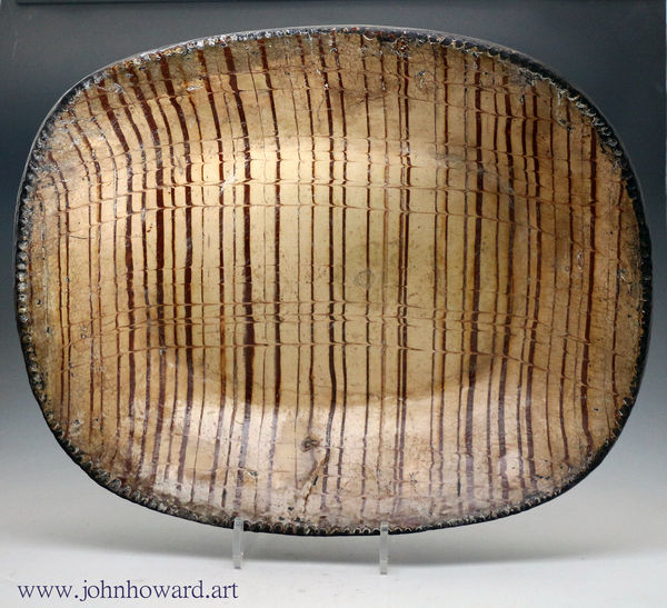 Slipware earthenware pottery comb decorated  baking loaf dish English late 18th century 