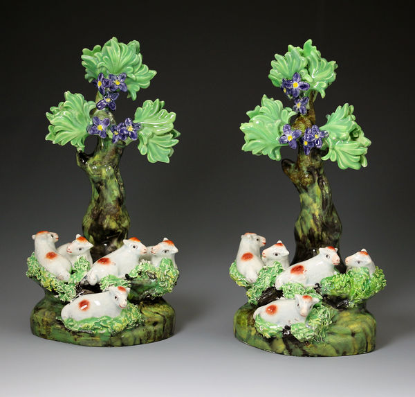 Staffordshire pottery pearlware bocage figures with groups of sheep, antique period early 19th century