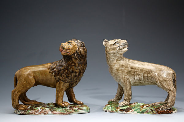 Antique Staffordshire pottery pearlware figures of Lion and Lioness