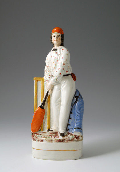 STAFFORDSHIRE POTTERY FIGURE OF A VICTORIAN CRICKET PLAYER