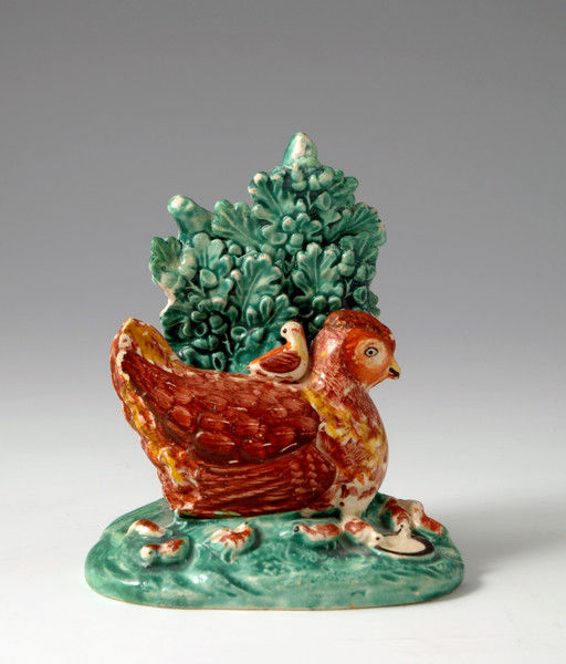 STAFFORDSHIRE FIGURE OF A HEN WITH CHICKS AND BOCAGE C1820