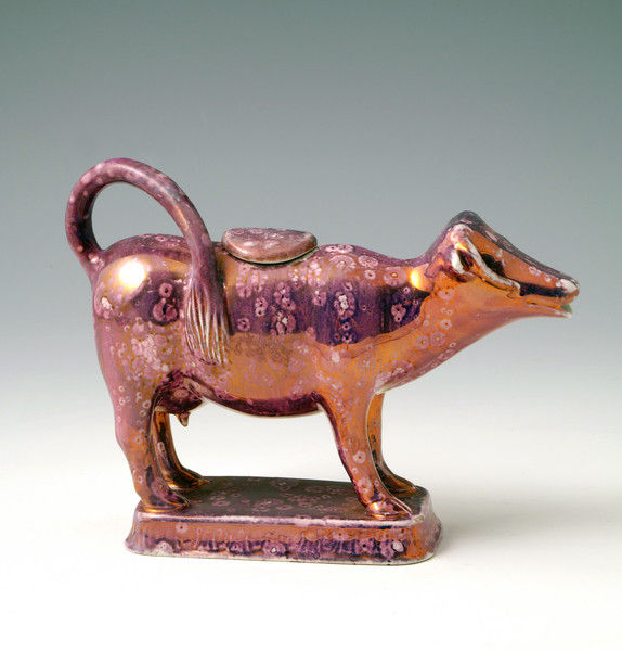 PINK LUSTER FIGURE OF A COW INTHE FORM OF A CREAMER C1815