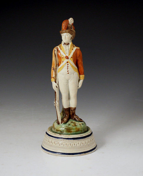 Antique English pottery figure of a Volunteer Soldier in Prattware c1790