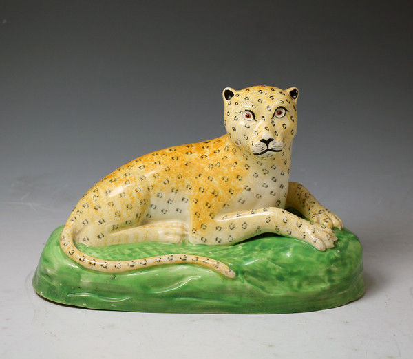English antique earthenware  Creamware pottery figure of a leopard, Staffordshire c1800  