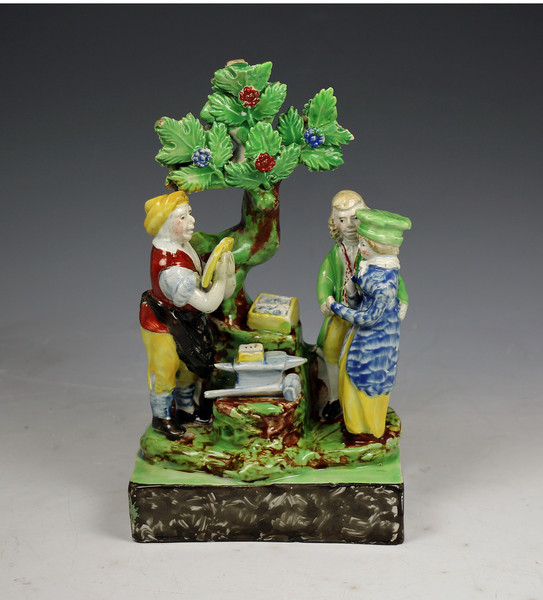 Staffordshire pottery figure group Gretna Green Marraige by the Blacksmith circa 1820