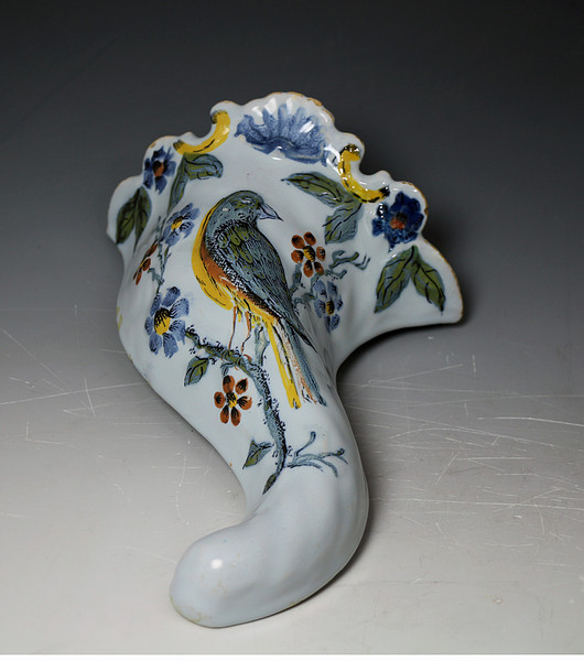 Antique English Delft ware wall pocket in polychrome with image of bird. Liverpool pottery c1740