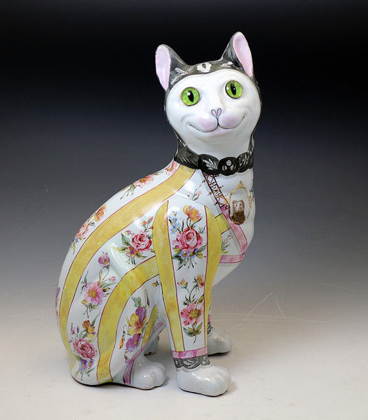 Galle pottery figure of a comical cat with glass eyes. c1900