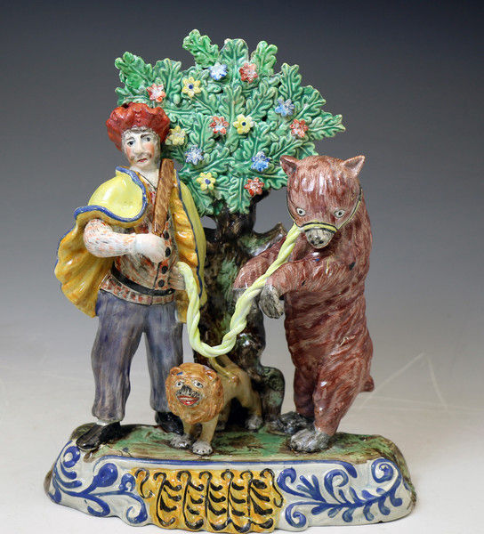 Antique Staffordshire  pottery figure of a Dancing Bear group with bocage c1820