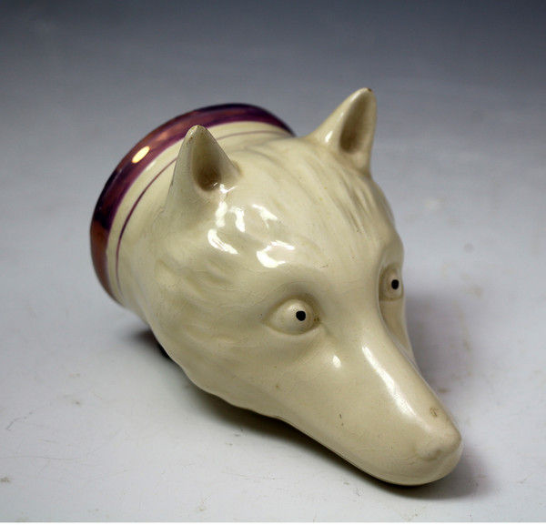 Antique Staffordshire pottery figure of a fox head stirrup cup with pink luster decoration