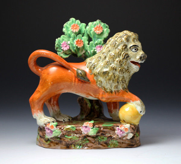 Antique English pottery Obadiah Sherratt Staffordshire pearlware figure of a lion with bocage c1820