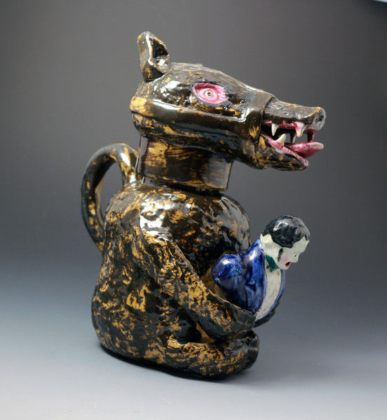 Antique Scottish pottery figure of the Russian Bear hugging Napleon in the form of a pitcher.