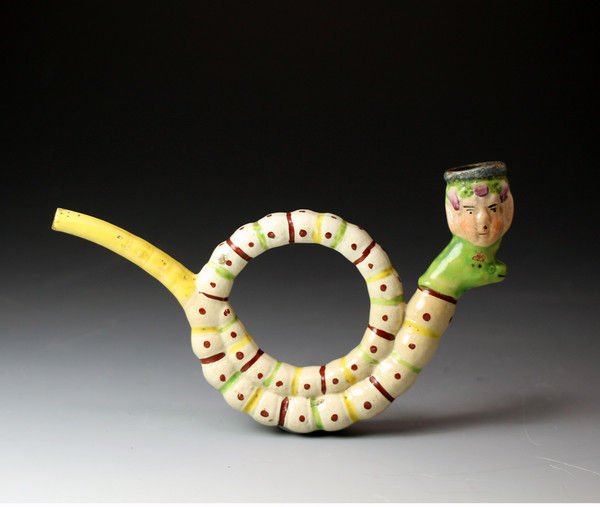 Antique English Staffordshire pottery pearlware figure of a pipe in the form of a snake and the figure of a head circa1815