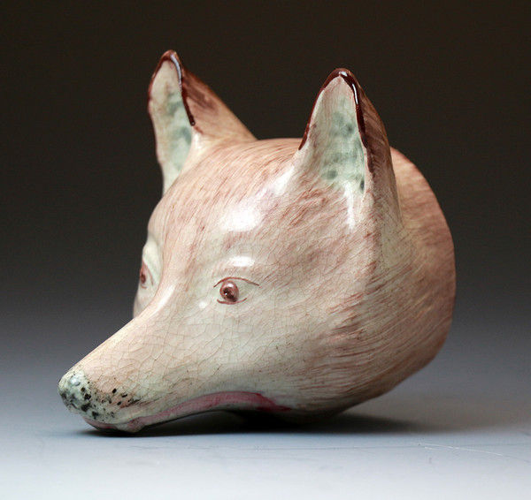 Antique English Staffordshire pottery figure of a fox head in the form of a stirrup cups. Early 19th century