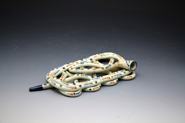 Antique English pottery smokers coil pipe in Pratt colurs, probably Staffordshire circa 1810