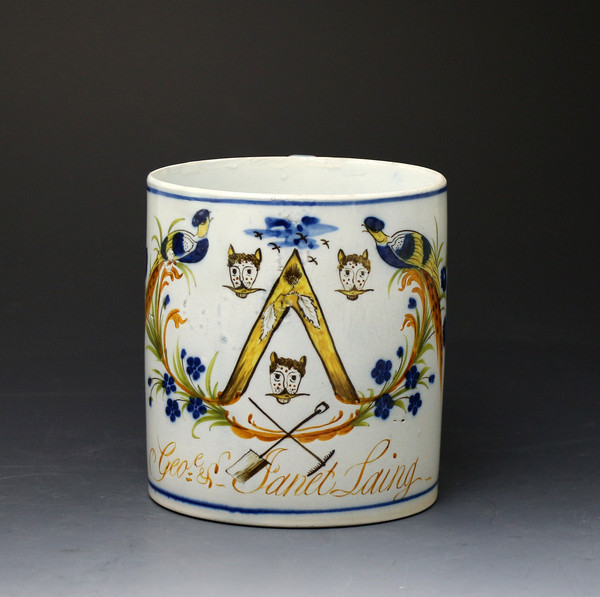 Antique English pottery Prattware tankard with peafowl named and with coat of arms.