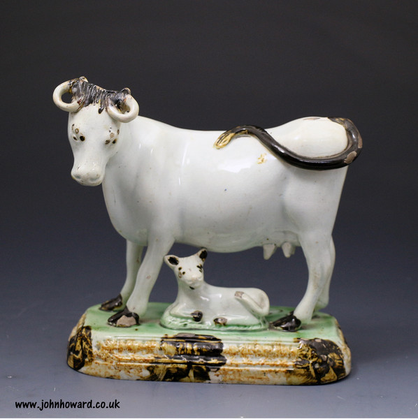 Antique English pottery figure of a cow named 