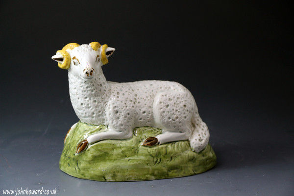 Antique pottery figure of a ram in Pratt Ware colours, English Yorkshire or Staffordshire pottery.
