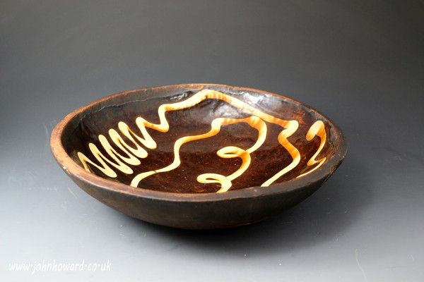 18th century antique earthenware slipware circular dish English pottery.