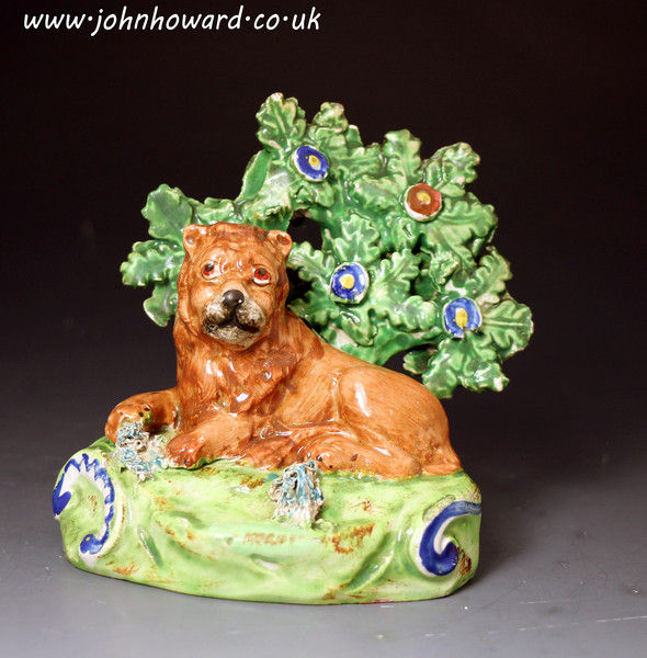 Antique Staffordshire pottery Waltom figure of a lion with bocage pearlware English circa 1820