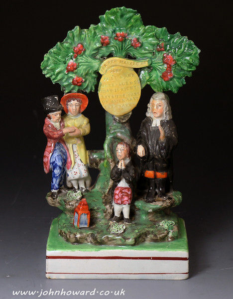 Antique Staffordshire pottery bocage type figure 