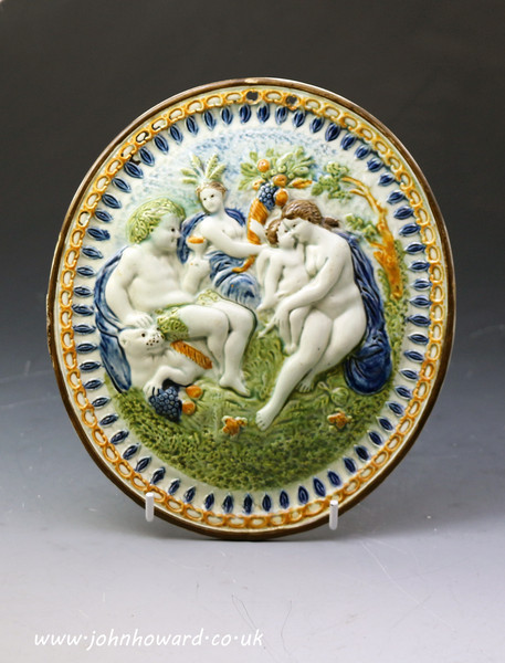 Antique Prattware pottery oval plaque with relief decorated Bacchus scene late 18th century.