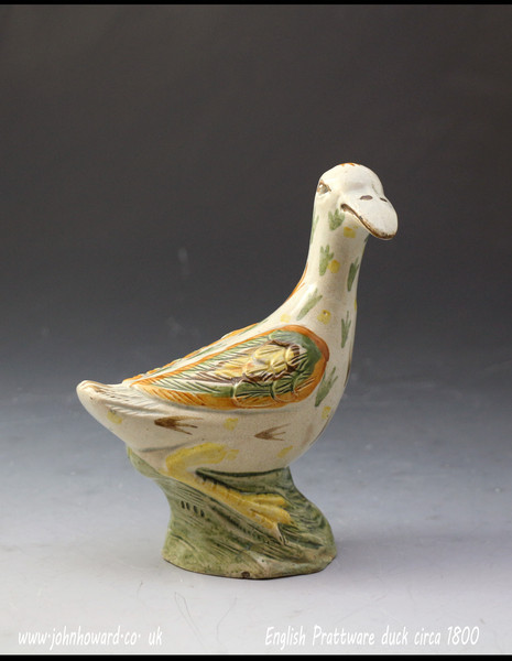 Antique English pottery figure of a duck in pratt colors c1800